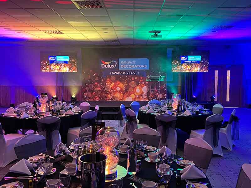 A room full of people attending an event we have provided services for